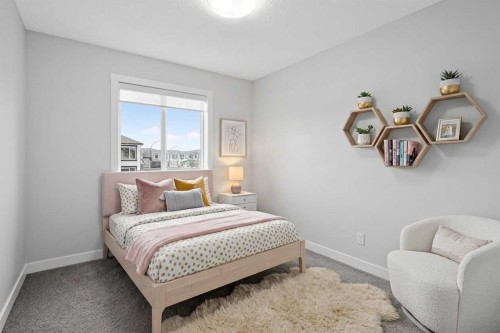 326 Creekside Boulevard Sw, Calgary, AB - Indoor Photo Showing Bedroom