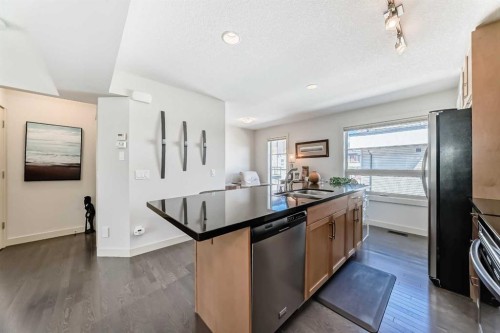 25 Aspen Hills Terrace Sw, Calgary, AB - Indoor Photo Showing Kitchen With Double Sink