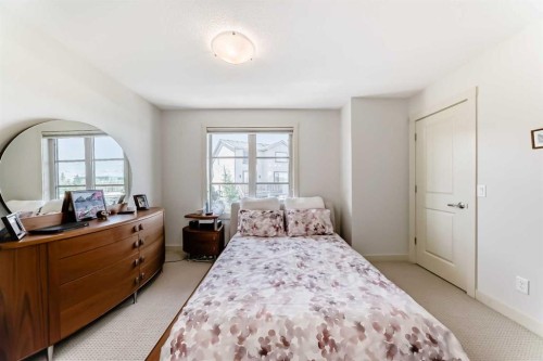 25 Aspen Hills Terrace Sw, Calgary, AB - Indoor Photo Showing Bedroom