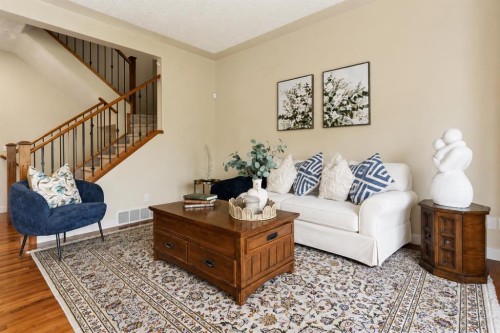 37 Prominence Park Sw, Calgary, AB - Indoor Photo Showing Living Room