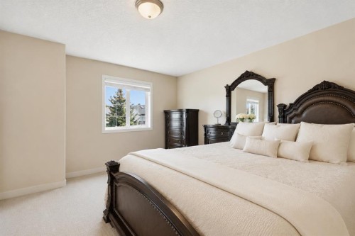 37 Prominence Park Sw, Calgary, AB - Indoor Photo Showing Bedroom
