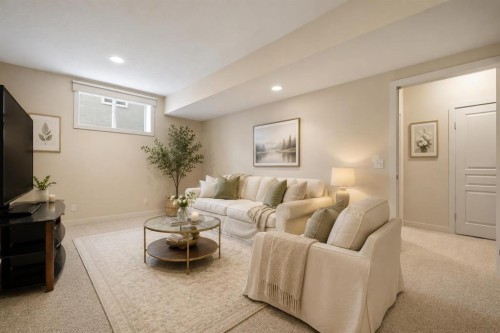 37 Prominence Park Sw, Calgary, AB - Indoor Photo Showing Living Room