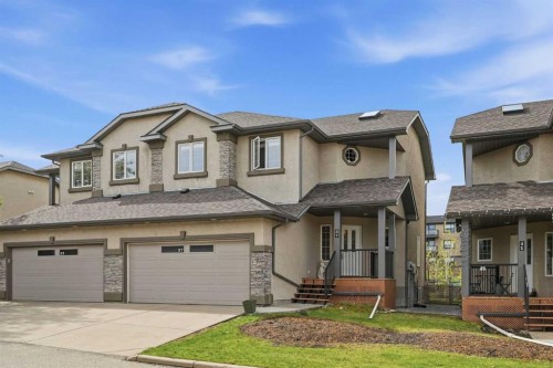 37 Prominence Park Sw, Calgary, AB - Outdoor With Facade
