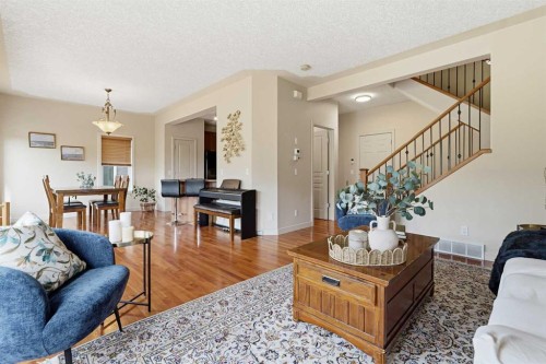 37 Prominence Park Sw, Calgary, AB - Indoor Photo Showing Living Room