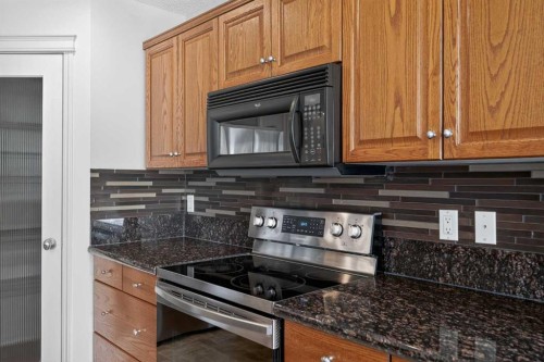 98 Cougarstone Close Sw, Calgary, AB - Indoor Photo Showing Kitchen