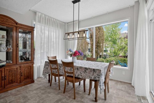 98 Cougarstone Close Sw, Calgary, AB - Indoor Photo Showing Dining Room