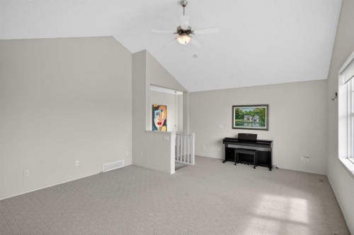 98 Cougarstone Close Sw, Calgary, AB - Indoor Photo Showing Other Room
