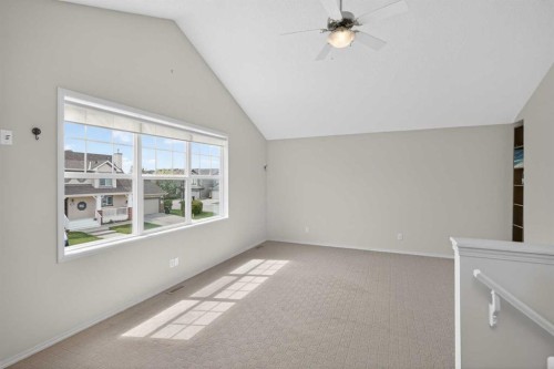 98 Cougarstone Close Sw, Calgary, AB - Indoor Photo Showing Other Room
