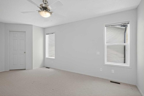 98 Cougarstone Close Sw, Calgary, AB - Indoor Photo Showing Other Room