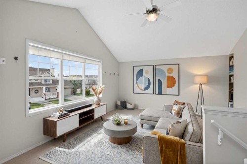 98 Cougarstone Close Sw, Calgary, AB - Indoor Photo Showing Living Room