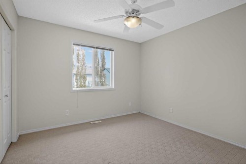 98 Cougarstone Close Sw, Calgary, AB - Indoor Photo Showing Other Room