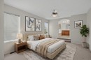 98 Cougarstone Close Sw, Calgary, AB  - Indoor Photo Showing Bedroom 