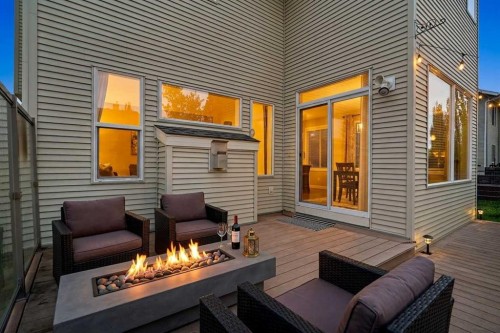 98 Cougarstone Close Sw, Calgary, AB - Outdoor With Deck Patio Veranda With Exterior