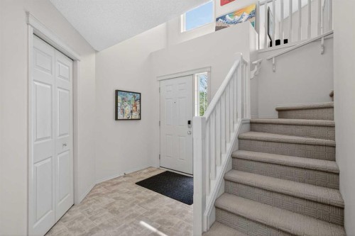 98 Cougarstone Close Sw, Calgary, AB - Indoor Photo Showing Other Room