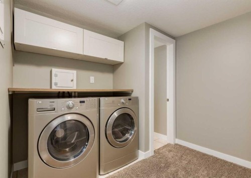 84 Fullerton Road Se, Calgary, AB - Indoor Photo Showing Laundry Room