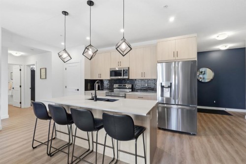 2103-55 Lucas Way Nw, Calgary, AB - Indoor Photo Showing Living Room