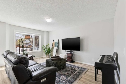 416 Stonegate Road Nw, Airdrie, AB - Indoor Photo Showing Living Room