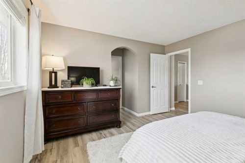 416 Stonegate Road Nw, Airdrie, AB - Indoor Photo Showing Bedroom