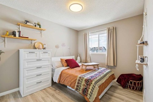 416 Stonegate Road Nw, Airdrie, AB - Indoor Photo Showing Bedroom