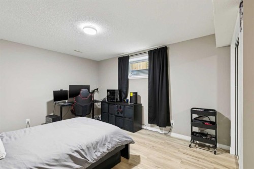 416 Stonegate Road Nw, Airdrie, AB - Indoor Photo Showing Bedroom