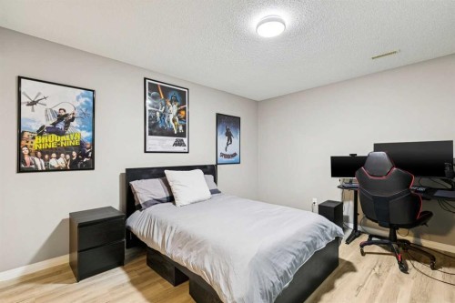 416 Stonegate Road Nw, Airdrie, AB - Indoor Photo Showing Bedroom