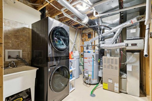 416 Stonegate Road Nw, Airdrie, AB - Indoor Photo Showing Laundry Room
