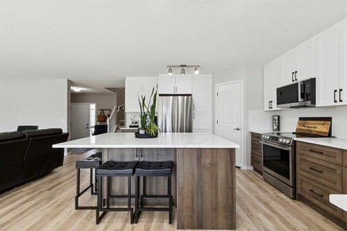 416 Stonegate Road Nw, Airdrie, AB - Indoor Photo Showing Kitchen With Upgraded Kitchen