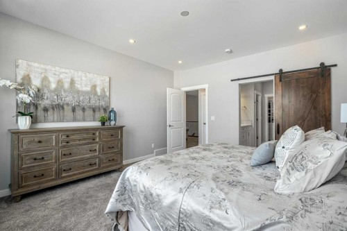 1205 Hillcrest Manor Estates, Strathmore, AB - Indoor Photo Showing Bedroom