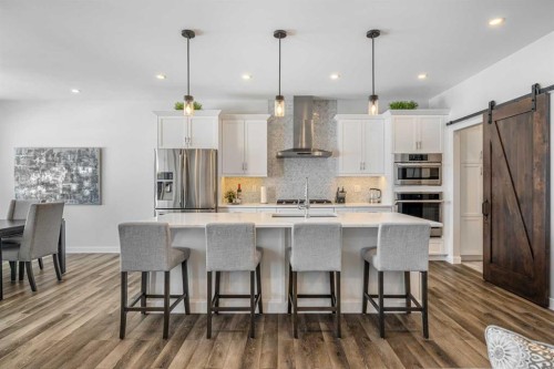 1205 Hillcrest Manor Estates, Strathmore, AB - Indoor Photo Showing Kitchen With Stainless Steel Kitchen With Upgraded Kitchen