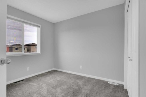 228 Cornerstone Grove Ne, Calgary, AB - Indoor Photo Showing Other Room