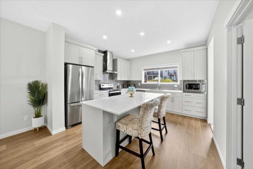 10 Lucas Close Nw, Calgary, AB - Indoor Photo Showing Kitchen With Stainless Steel Kitchen With Upgraded Kitchen