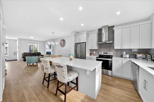 10 Lucas Close Nw, Calgary, AB - Indoor Photo Showing Kitchen With Stainless Steel Kitchen With Upgraded Kitchen
