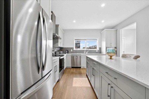 10 Lucas Close Nw, Calgary, AB - Indoor Photo Showing Kitchen With Stainless Steel Kitchen With Upgraded Kitchen