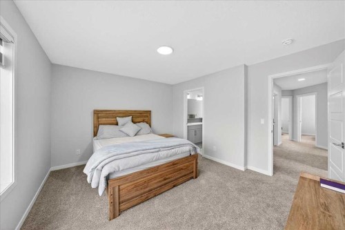 10 Lucas Close Nw, Calgary, AB - Indoor Photo Showing Bedroom
