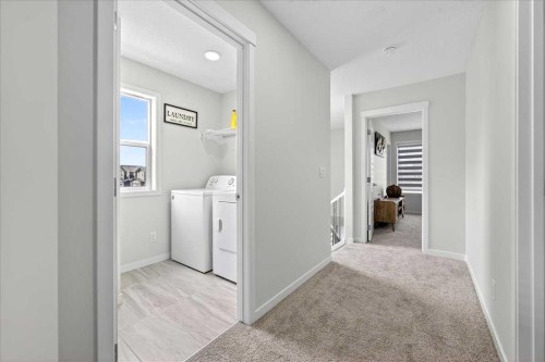 10 Lucas Close Nw, Calgary, AB - Indoor Photo Showing Laundry Room