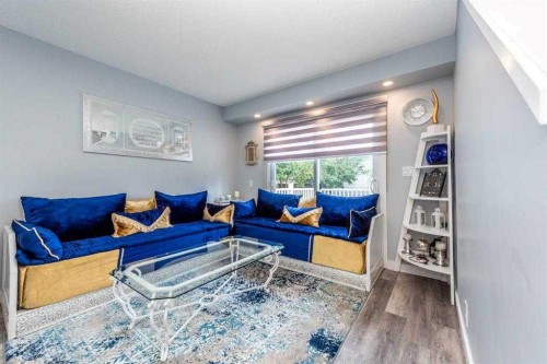 23 Falsby Place Ne, Calgary, AB - Indoor Photo Showing Living Room