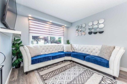 23 Falsby Place Ne, Calgary, AB - Indoor Photo Showing Other Room