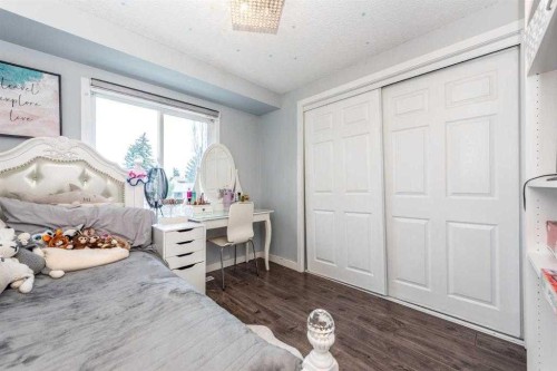 23 Falsby Place Ne, Calgary, AB - Indoor Photo Showing Bedroom