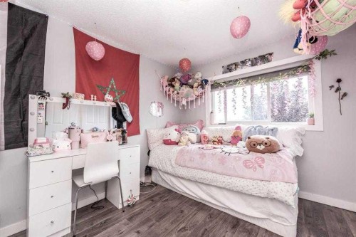 23 Falsby Place Ne, Calgary, AB - Indoor Photo Showing Bedroom