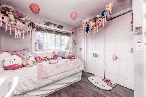 23 Falsby Place Ne, Calgary, AB - Indoor Photo Showing Bedroom