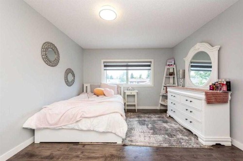 23 Falsby Place Ne, Calgary, AB - Indoor Photo Showing Bedroom