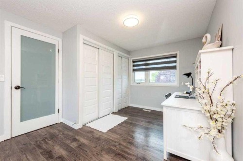 23 Falsby Place Ne, Calgary, AB - Indoor Photo Showing Other Room
