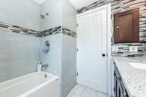 23 Falsby Place Ne, Calgary, AB - Indoor Photo Showing Bathroom