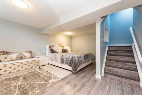 23 Falsby Place Ne, Calgary, AB - Indoor Photo Showing Bedroom