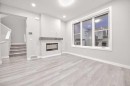 917 Crestridge Common Sw, Calgary, AB  - Indoor With Fireplace 