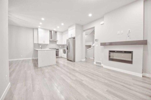 917 Crestridge Common Sw, Calgary, AB - Indoor With Fireplace