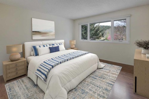 82 Point Drive Nw, Calgary, AB - Indoor Photo Showing Bedroom
