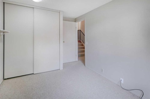 82 Point Drive Nw, Calgary, AB - Indoor Photo Showing Other Room