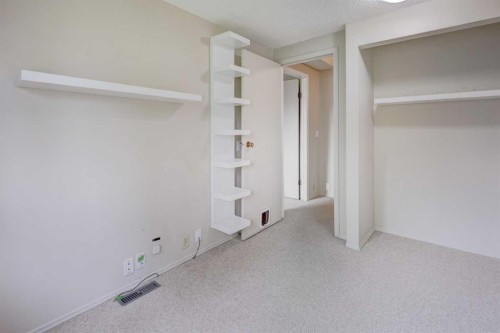 82 Point Drive Nw, Calgary, AB - Indoor Photo Showing Other Room