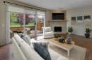 82 Point Drive Nw, Calgary, AB  - Indoor Photo Showing Living Room With Fireplace 